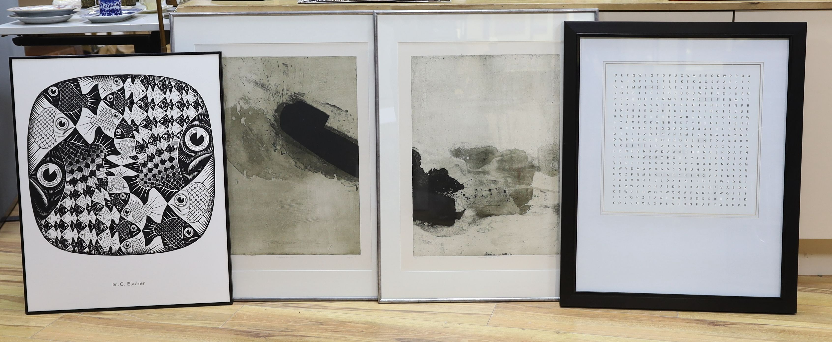 A pair of modern French limited edition monochrome prints, 64 x 48cm, a Gallery Art Studio print, 'Lost for Words' and an M.C. Escher print